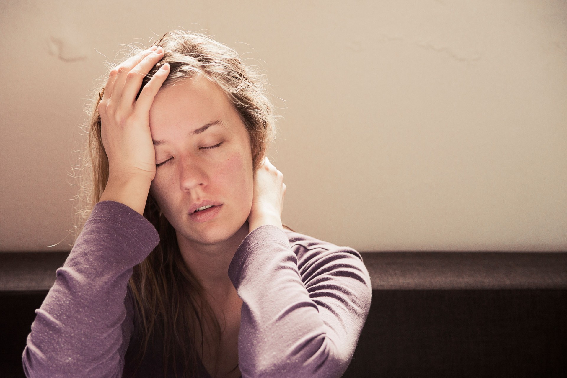 Lonely sad woman deep in thoughts